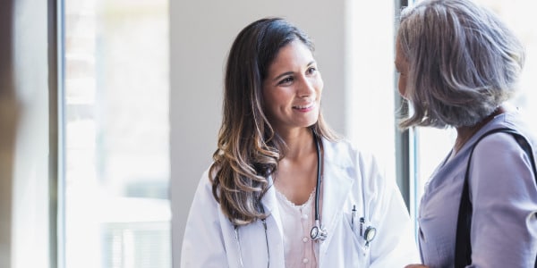 Nurse talking to patient