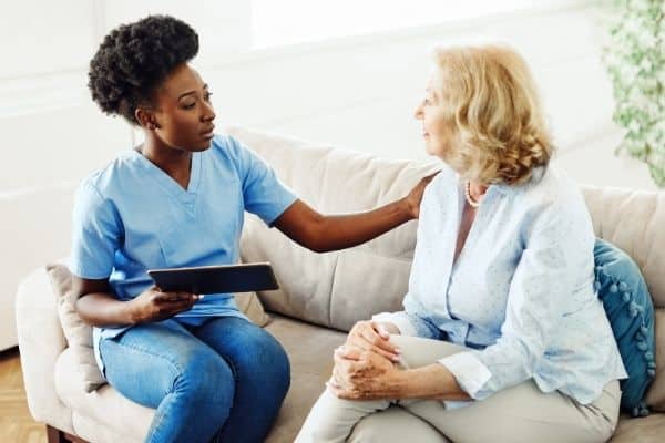 Nurse helping a patient