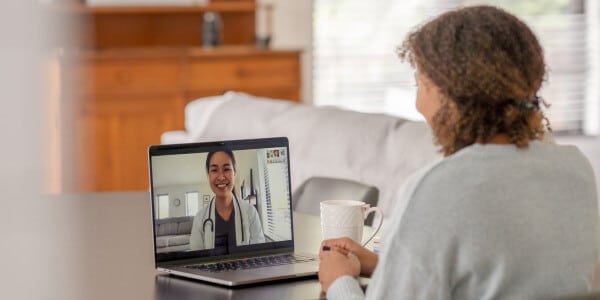 Nurse Speaking with Patient via Telehealth