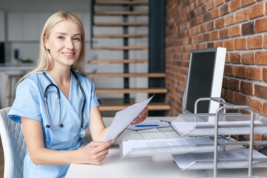 Nurse Practitioner at desk