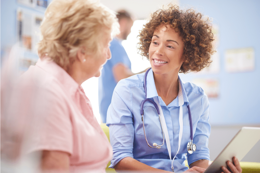 Nurse talking to patient